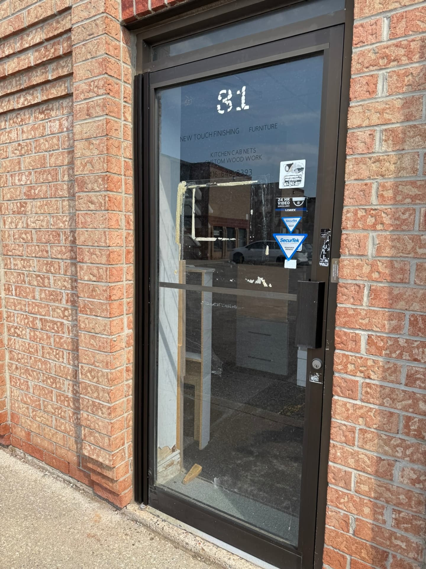 Bronze Continuous Hinge Installation in Brampton, Ontario